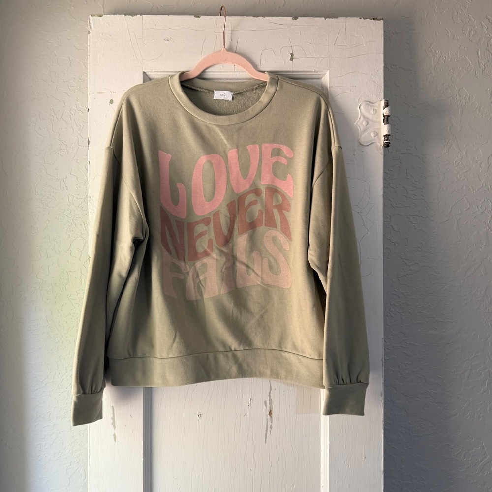 12PM Love Never Fails Graphic Sweatshirt Sage Green Retro Wavy Text Small